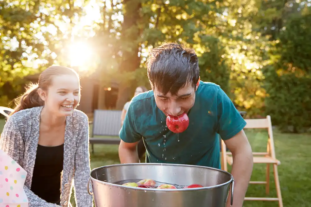 Influence of the Roman - Feralia and Apple Bobbing